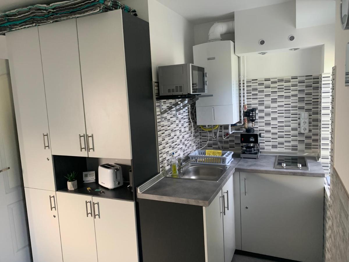 Komo Apartment Buk Luaran gambar