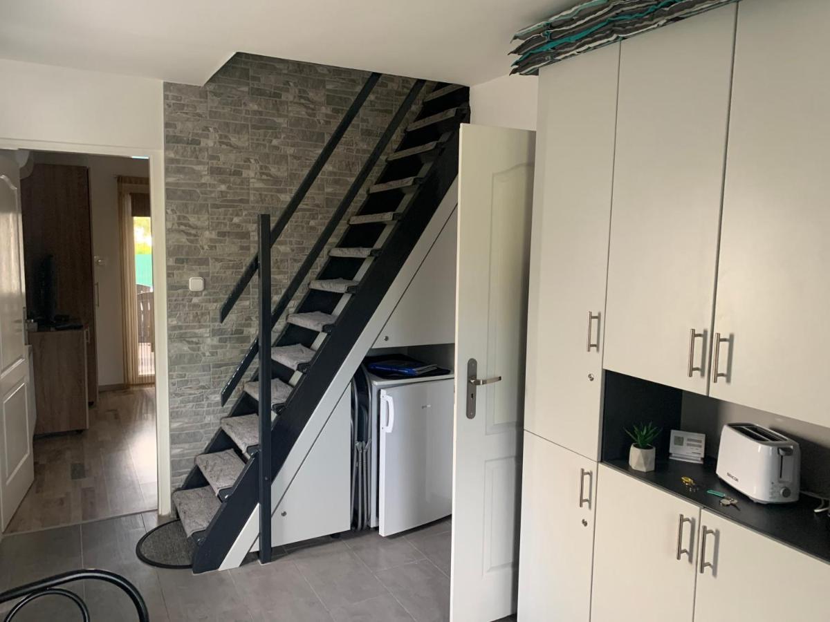 Komo Apartment Buk Luaran gambar
